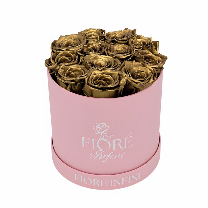 gold roses in a pink box