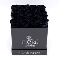 16 black forever roses in a black square box by Fiore Infini