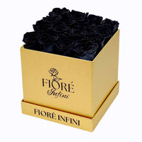black roses in gold box