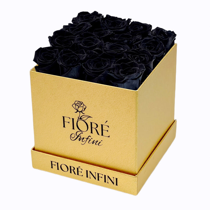 black roses in gold box