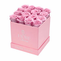 pink preserved roses in pink square box