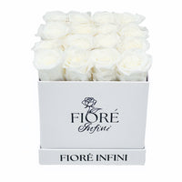 white roses in white box