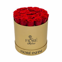 24 red forever roses in a round gold box