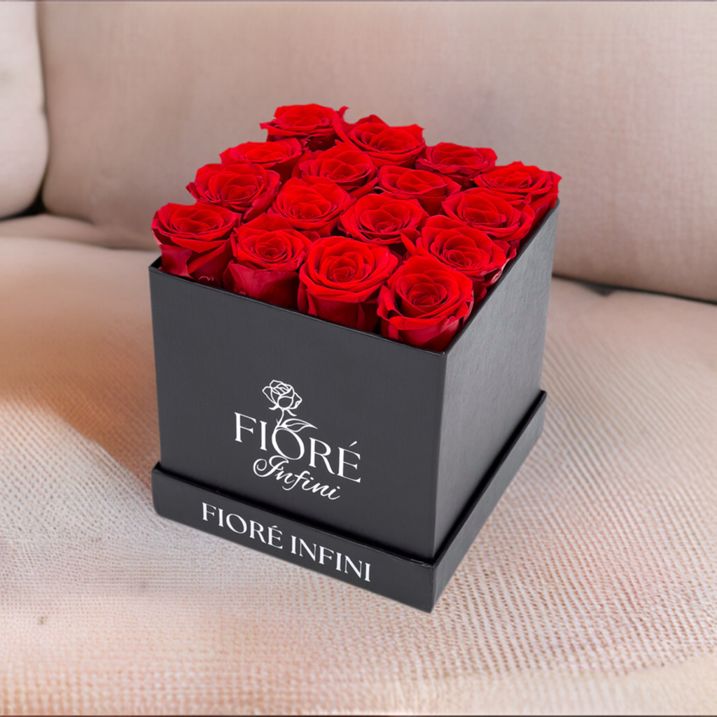red forever roses in a black box