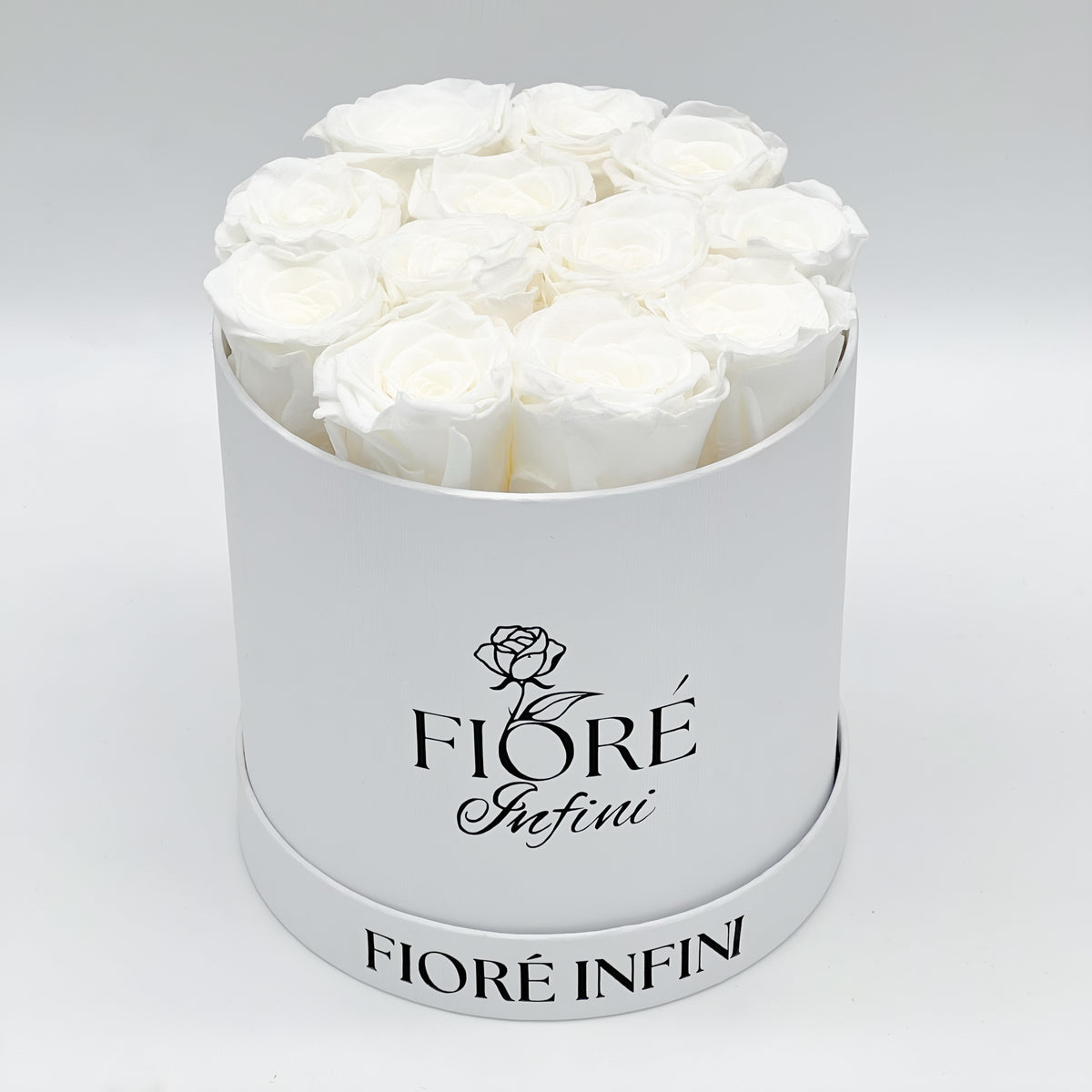 White Forever Roses In A Round White Box