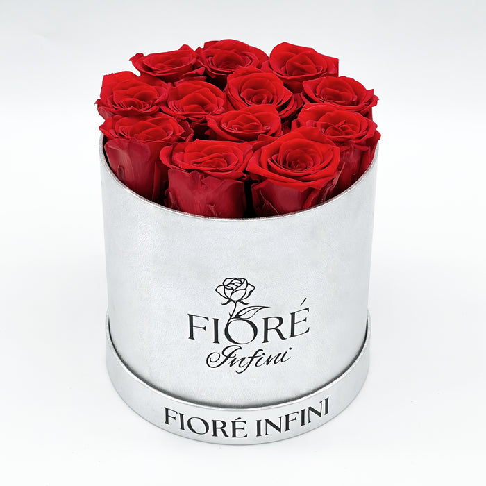 12 red forever roses in a round silver box