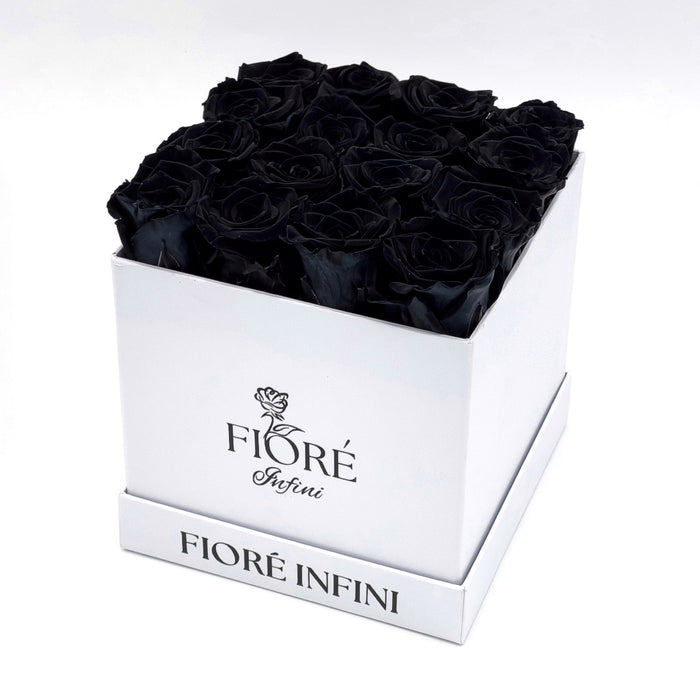 16 black forever roses in a white square box by Fiore Infini