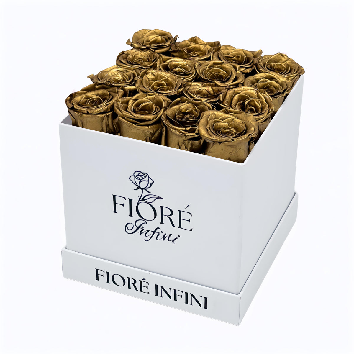 gold roses in a white box