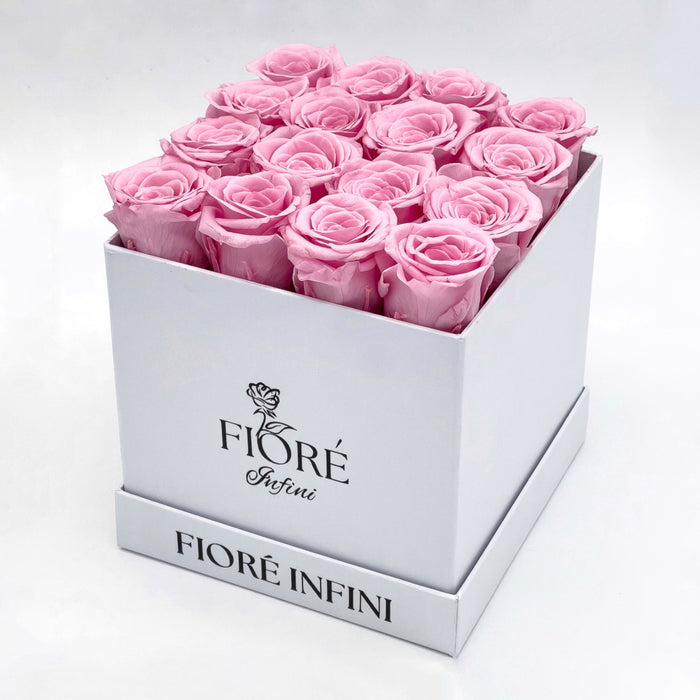 16 Light Pink Forever Roses In a White Square Box by Fiore Infini