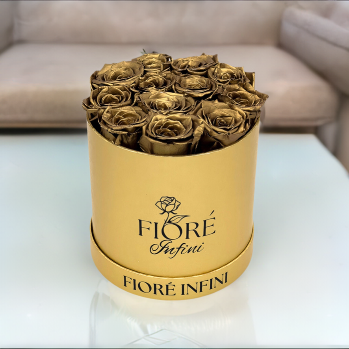 gold roses in a gold box