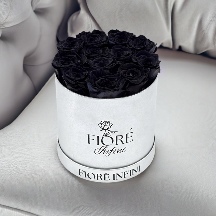 black roses in a box