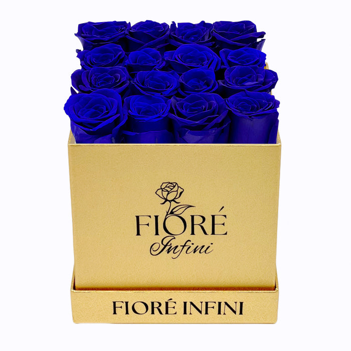 Blue Forever Roses In A Gold Square Box by Fiore Infini