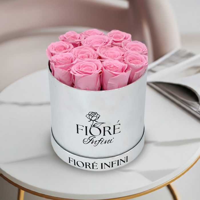 Pink Forever Roses in A Round Silver Box by Fiore Infini