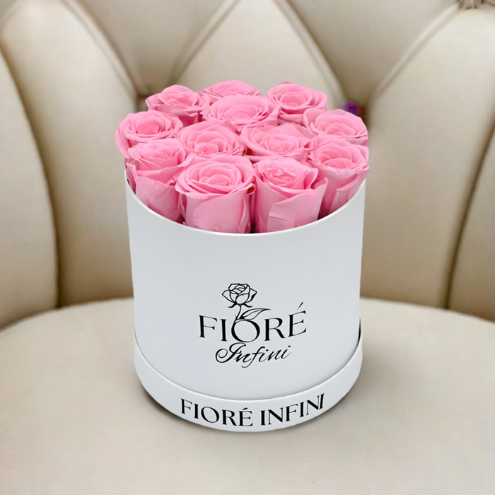 pink roses in a white box