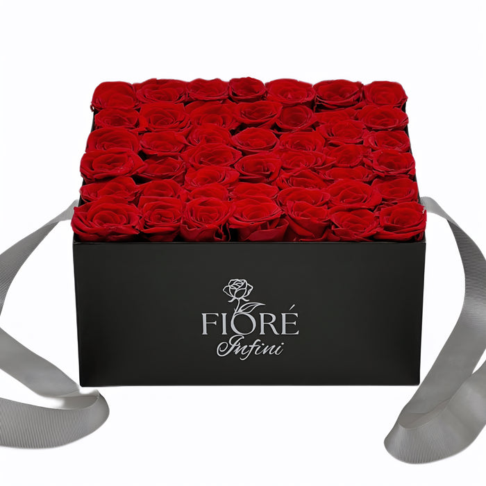 Red Forever Roses In a Large Black Square Box