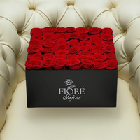 Red Forever Roses In a Large Black Square Box