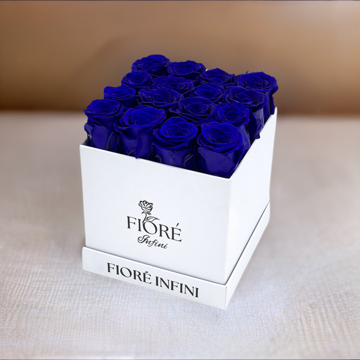 royal blue forever roses in a square white box