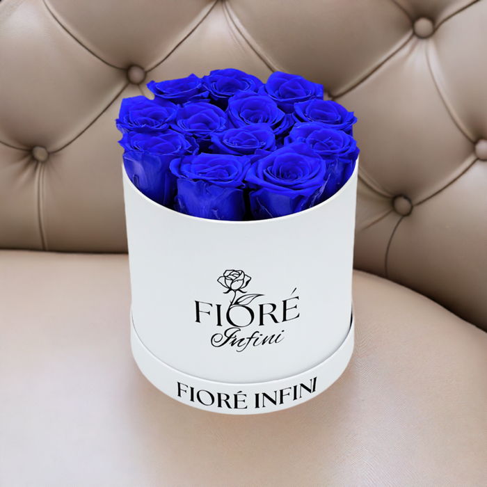 blue roses in a white box