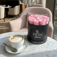 fiore infini pink preserved roses on the table