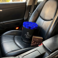 preserved blue roses and luxury chocolates