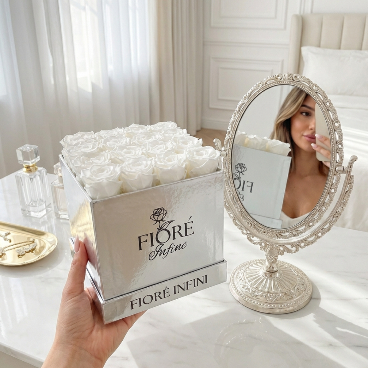 an influencer taking photo of white preserved roses