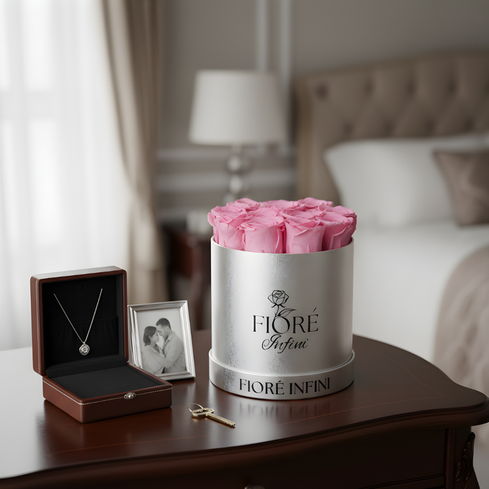 pink preserved roses in a silver box in a bedroom