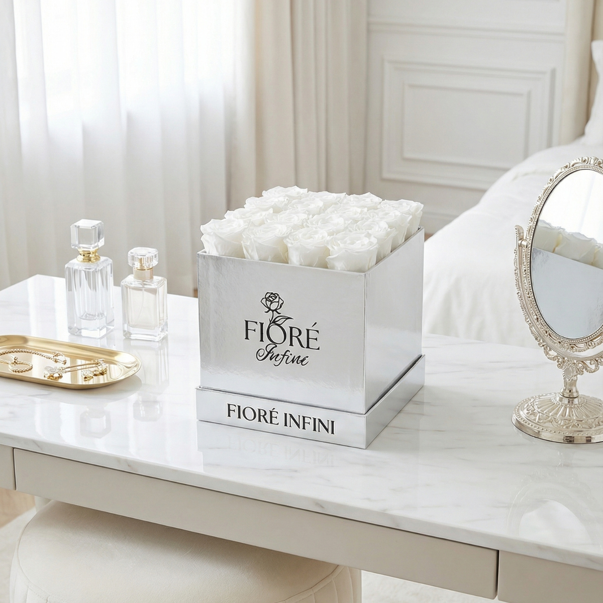 white preserved rose sin a silver box