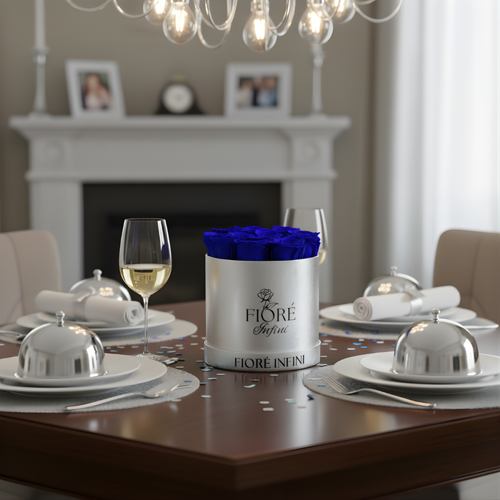 royal blue preserved roses in a silver box, on a dinner table