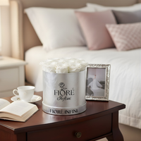 silver box in a bedroom near the bed